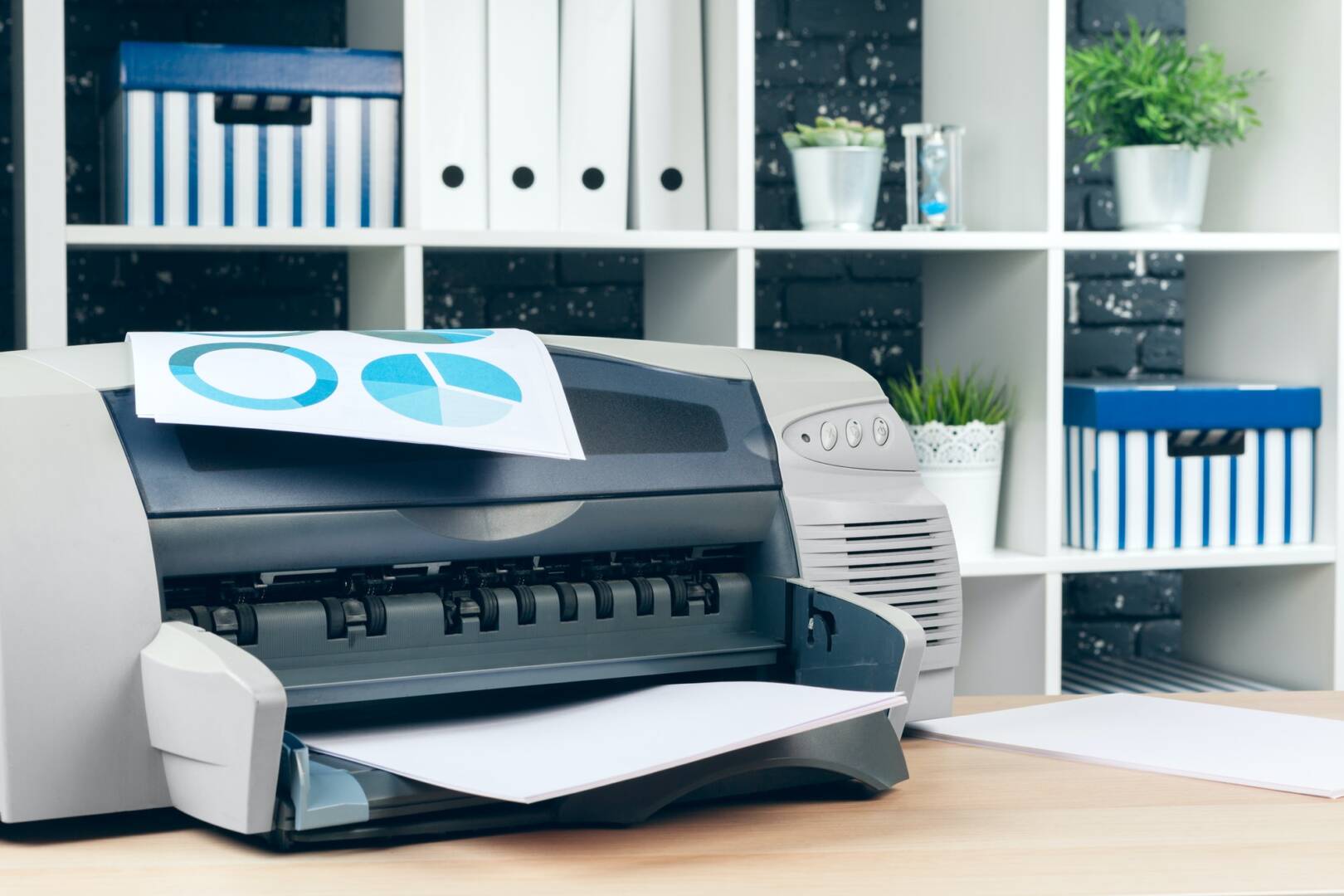 Copier or printer in a modern office interior close up